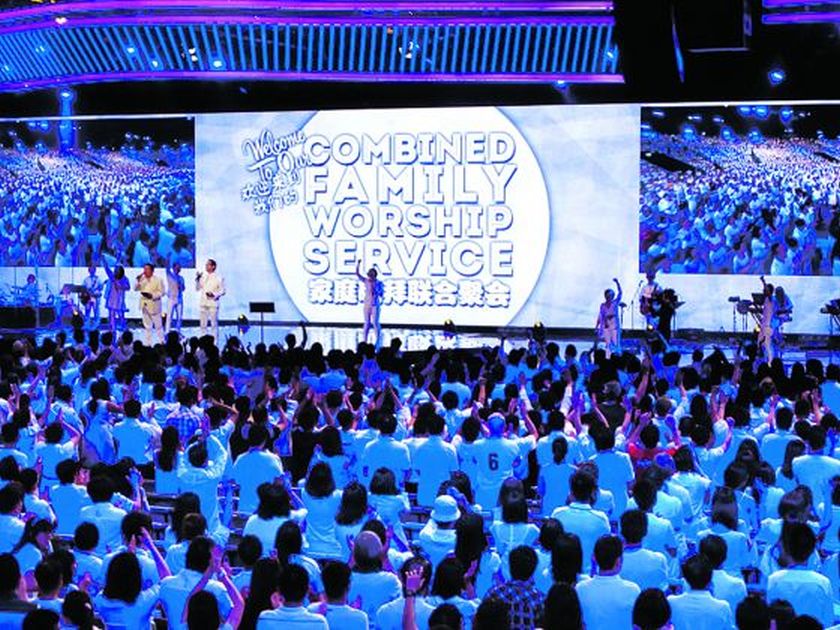 Thousands of worshippers wore white yesterday at a Faith Community Baptist Church service. u00e2u20acu2022 Picture by Alvin Chong/Today