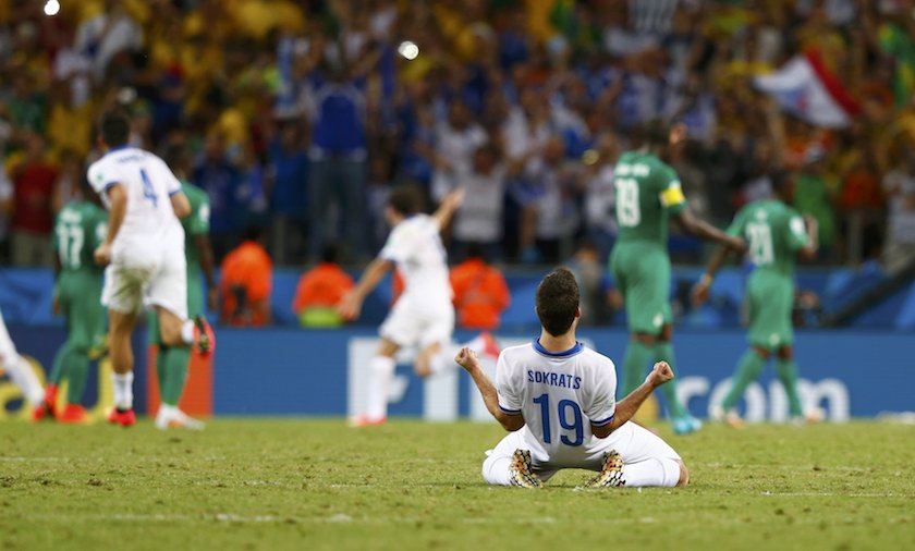Greeceu00e2u20acu2122s Sokratis Papastathopoulos celebrates after teammate Giorgios Samaras scored on a penalty kick during their 2014 World Cup Group C match against Ivory Coast at the Castelao arena in Fortaleza June 24, 2014. u00e2u20acu201d Reuters pic