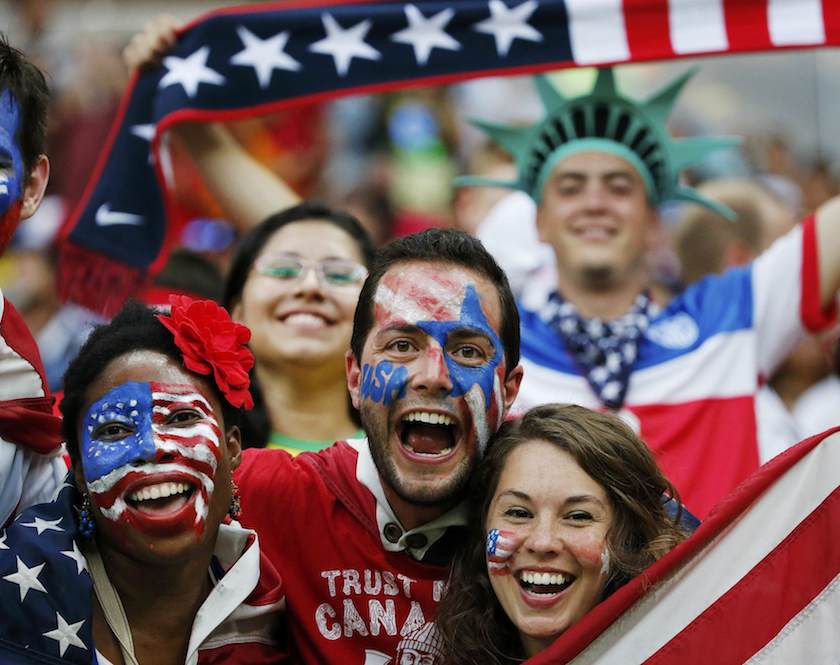 Fans of the US cheer before their 2014 World Cup G match against Portugal at the Amazonia arena in Manaus June 22, 2014. u00e2u20acu201d Reuters pic