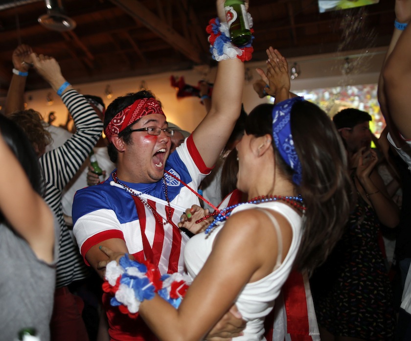Fans cheer for USA's first goal during the 2014 World Cup Group G match between Portugal and the US at a viewing party in Los Angeles, California June 22, 2014.u00c2u00a0u00e2u20acu201d Reuters pic
