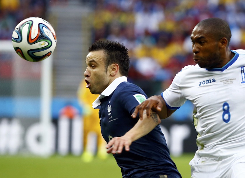 France's Mathieu Valbuena (left) and Wilson Palacios of Honduras fight for the ball during their 2014 World Cup Group E match at the Beira-Rio stadium in Porto Alegre June 15, 2014.      u00e2u20acu201d Reuters pic