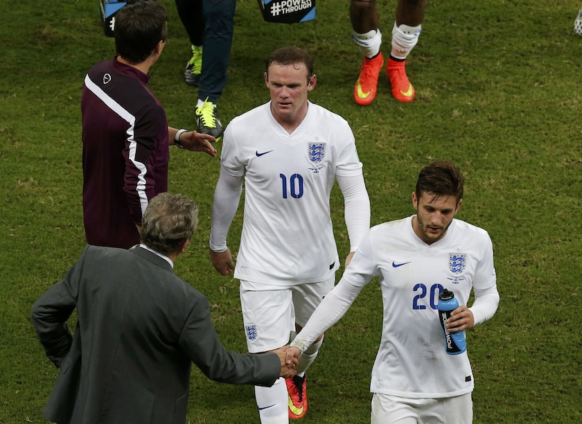 England's Adam Lallana (right) and Wayne Rooney leave the pitch after their 2014 World Cup Group D match against Italy at the Amazonia arena in Manaus June 15, 2014.u00c2u00a0u00e2u20acu201d Reuters pic