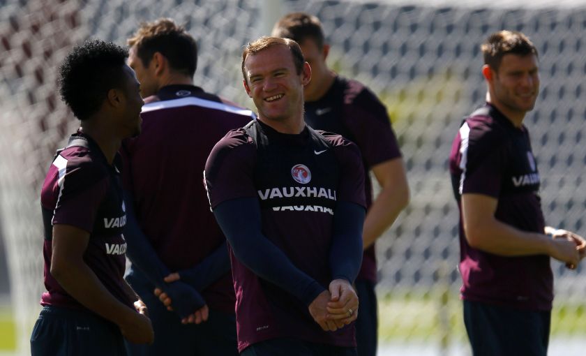 England's Wayne Rooney (centre) talks with Raheem Sterling (left) during a training session at the 2014 World Cup in Rio de Janeiro June 16, 2014. u00e2u20acu2022 Reuters pic  