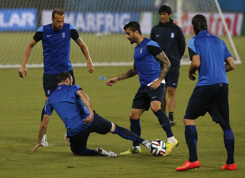 Greece's national team players attend a training session at the Dunas Arena stadium in Natal June 19, 2014. Greece will face Japan on tomorrow. u00e2u20acu201d Reuters pic