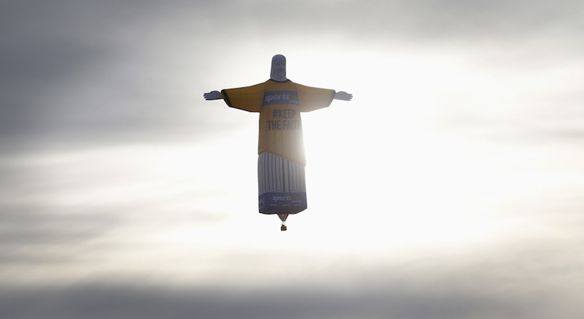 A hot air balloon in the shape of Brazil's Christ the Redeemer statue flies over the Sydney skyline June 12, 2014. u00e2u20acu201du00c2u00a0Reuters pic