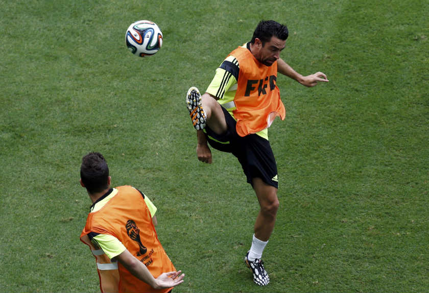 Spain's Xavi Hernandez kicks the ball during a training session at the Arena Fonte Nova stadium in Salvador. u00e2u20acu201d Reuters pic