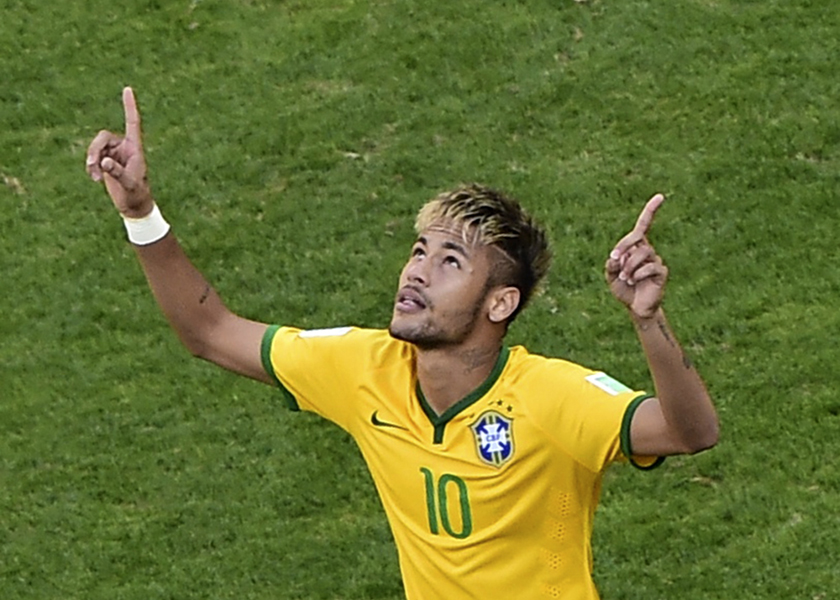 Brazil's Neymar celebrates after scoring in the penalty shoot out against Chile during their 2014 World Cup round of 16 game at the Mineirao stadium in Belo Horizonte, July 3, 2014. u00e2u20acu201d Reuters pic