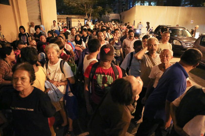 People lining up for food at a soup kitchen in Kuala Lumpur, June 23, 2014. u00e2u20acu201d Picture by Choo Choy May