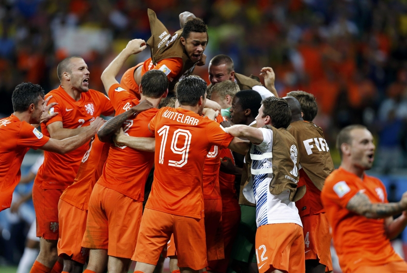 The Netherlands players celebrate after winning their penalty shootout in their 2014 World Cup quarter-finals against Costa Rica at the Fonte Nova arena in Salvador July 6, 2014. u00e2u20acu201d Reuters pic