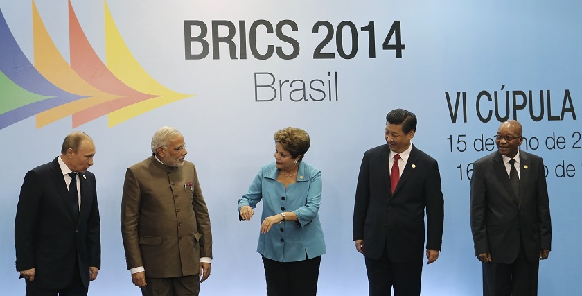 (From left) Russian President Vladimir Putin, Indian Prime Minister Narendra Modi, Brazilian President Dilma Rousseff, Chinese President Xi Jinping and South African President Jacob Zuma talk at a group photo session during the 6th Brics summit in Fortale