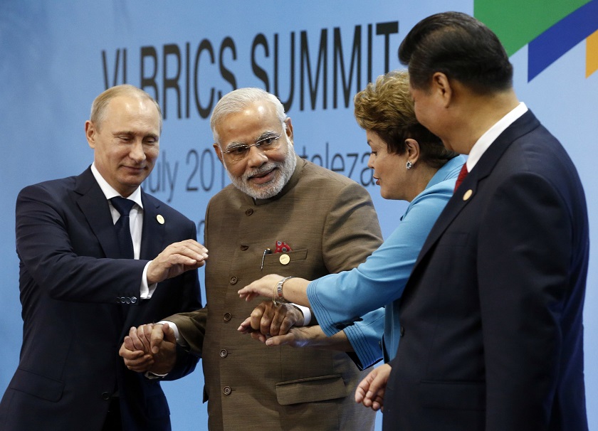 (From left) Russiau00e2u20acu02dcs President Vladimir Putin, Indiau00e2u20acu02dcs Prime Minister Narendra Modi, Brazilu00e2u20acu02dcs President Dilma Rousseff and Chinau00e2u20acu02dcs President Xi Jinping pose for a group picture during the VI BRICS Summit in Fortaleza July 15, 2014.  u00e2u20acu201d Reuters pi