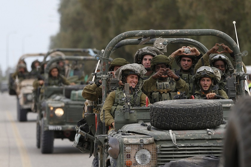 Israeli soldiers ride army jeeps near Sufa, outside the southern Gaza Strip July 17, 2014.u00e2u20acu201d Reuters pic