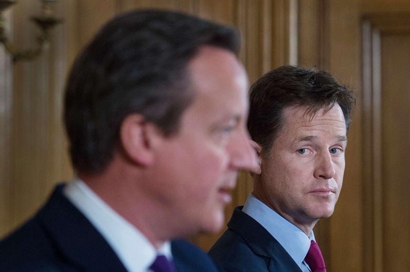 Britainu00e2u20acu2122s Deputy Prime Minister Nick Clegg (right) listens to Prime Minister David Cameron speak at a joint news conference at 10 Downing Street in central London July 10, 2014. u00e2u20acu201d Reuters pic