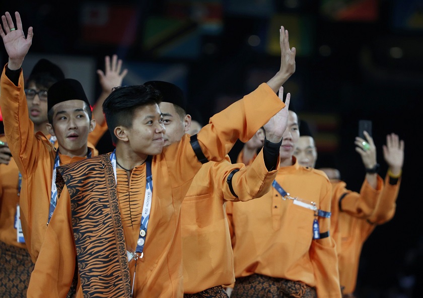 Malaysiau00e2u20acu02dcs athletes wave during the opening ceremony for the 2014 Commonwealth Games at Celtic Park in Glasgow, Scotland, July 23, 2014. u00e2u20acu201d Reuters pic