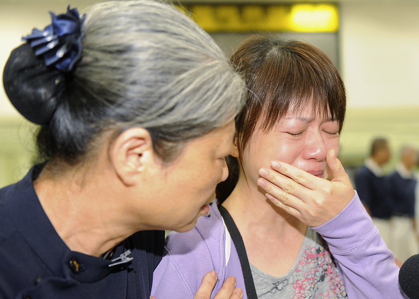 A relative of a passenger on board the crashed TransAsia Airways plane cries in Kaohsiung International Airport, July 24, 2014. u00e2u20acu201d Reuters pic 
