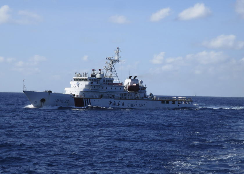 A Chinese navy frigate is seen on the horizon in waters close to the Haiyang Shiyou 981 in the South China Sea, July 27, 2014. u00e2u20acu201d Reuters picn