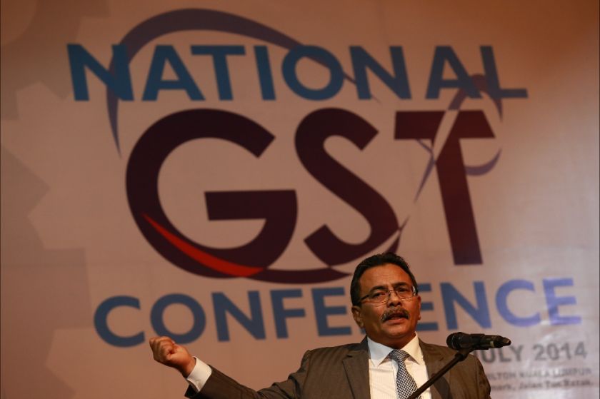 Customs D-G Datuk Seri Khazali Ahmad speaks at the National GST Conference in Kuala Lumpur, July 11, 2014.  u00e2u20acu201d Picture by Saw Siow Feng
