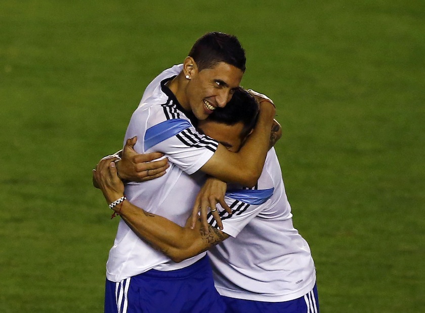 Argentina's national team player Angel di Maria (left) jokes with his teammates during their training session in Rio de Janeiro July 13, 2014, ahead of their 2014 World Cup Final match against Germany on July 14.u00c2u00a0u00e2u20acu201d Reuters pic