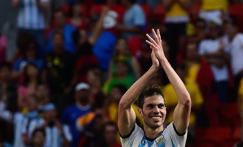 Argentina's defender Jose Maria Basanta celebrates after his team won their quarter-final football match against Belgium at the Mane Garrincha National Stadium in Brasilia July 5, 2014. u00e2u20acu201d AFP pic