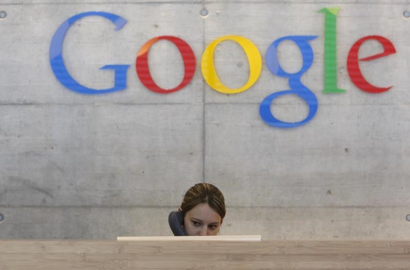 An employee answers phone calls at the switchboard of the Google office in Zurich August 18, 2009 Reuters