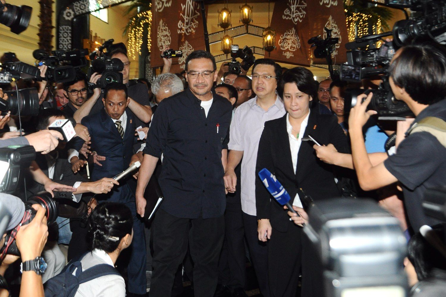Minister of Defense, Datuk Seri Hishamuddin, and Minister of Transport, Seri Liow Tiong Lai make their way to a meeting at the Sama Sama, KLIA, July 19, 2014. u00e2u20acu201d Picture by Choo Choy May