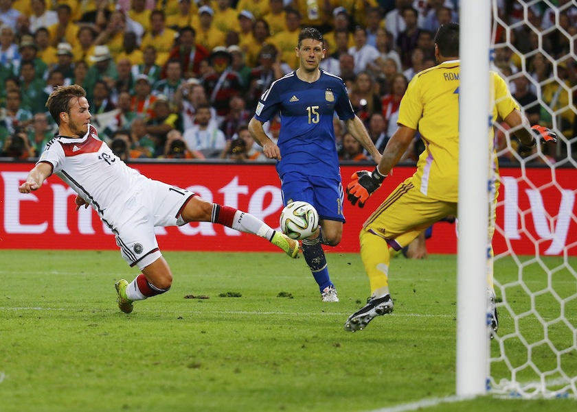 Germany's Mario Goetze shoots to score a goal past Argentina's goalkeeper Sergio Romero during extra time in their 2014 World Cup final at the Maracana stadium in Rio de Janeiro July 14, 2014.u00c2u00a0u00e2u20acu201d Reuters pic