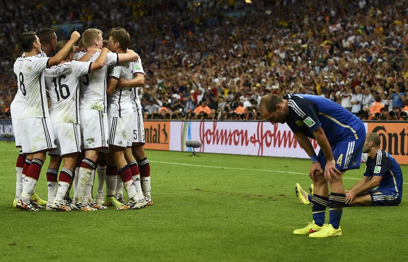 Germany's national players celebrate Mario Goetze's goal beside Argentina's Pablo Zabaleta and Javier Mascherano (right) in their 2014 World Cup final at the Maracana stadium in Rio de Janeiro July 14, 2014.u00c2u00a0u00e2u20acu201d Reuters pic