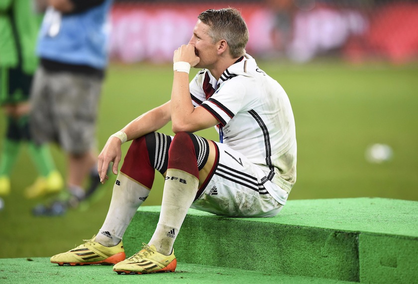 Germany's Bastian Schweinsteiger sits and rests after winning the World Cup trophy at the end of their 2014 World Cup final against Argentina at the Maracana stadium in Rio de Janeiro July 14, 2014. u00e2u20acu201du00c2u00a0Reuters pic