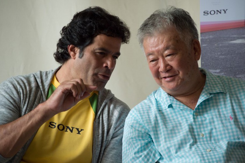 Former Brazilian footballer Rai Souza Vieira de Oliveira (left) speaks with dual-nationality Japanese and Brazilian former footballer Sergio Echigo in Rio de Janeiro, Brazil, on July 11, 2014. u00e2u20acu201d AFP pic