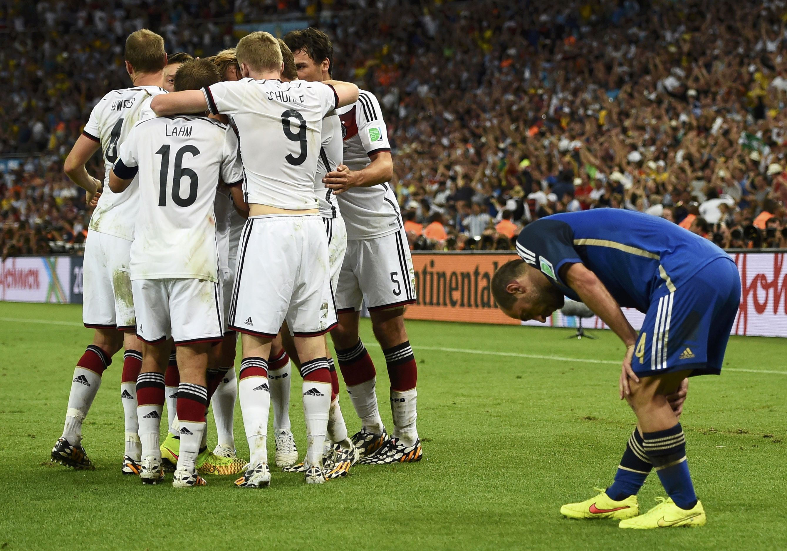 Germany's national players celebrate teammate Mario Goetze's goal beside Argentina's Pablo Zabaleta during extra time in their 2014 World Cup final at the Maracana stadium in Rio de Janeiro July 14, 2014.u00c2u00a0u00e2u20acu201du00c2u00a0Reuters pic