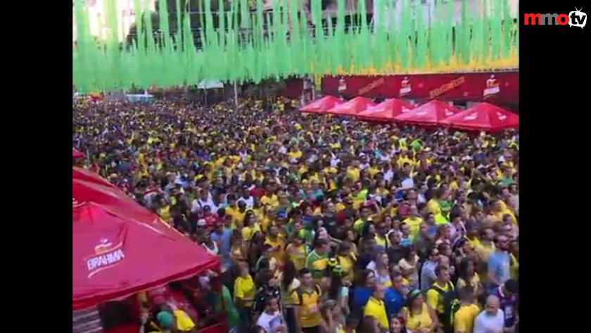 Football fans gather in Alzirao in Rio de Janeiro to watch Brazil play in the World Cup in this screenshot from the AFP video. 