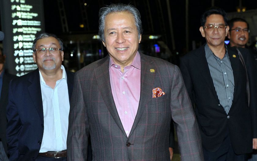 Foreign Minister Datuk Seri Anifah Aman heading to the departure hall at the Kuala Lumpur International Airport on his way to Ukraine, July 20, 2014. u00e2u20acu201d Bernama pic