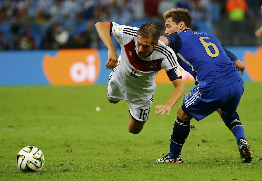 Germany's Philipp Lahm fights for the ball with Argentina's Lucas Biglia during their 2014 World Cup final at the Maracana stadium in Rio de Janeiro July 14, 2014.u00c2u00a0u00e2u20acu201d Reuters pic