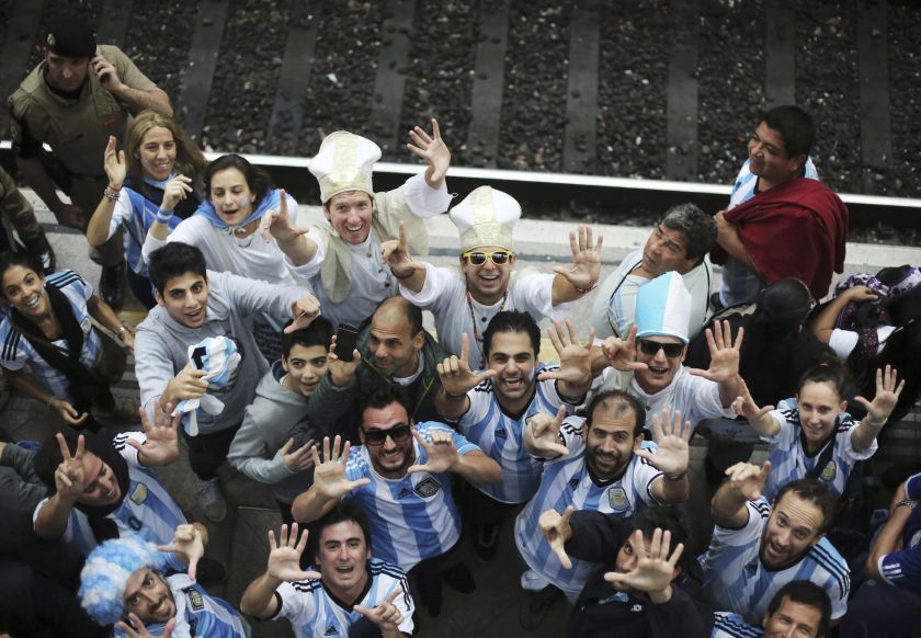 Argentina fans show 'seven', in reference to the number of goals Brazil let in against Germany in their semi-final match July 10, 2014. u00e2u20acu201d Reuters pic