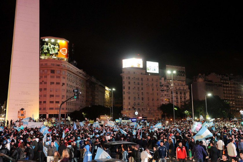 File picture shows Argentine fans celebrating around the Obelisk in Buenos Aires on July 9, 2014, after Argentina beat the Netherlands in their World Cup semi-final match. u00e2u20acu201d AFP pic