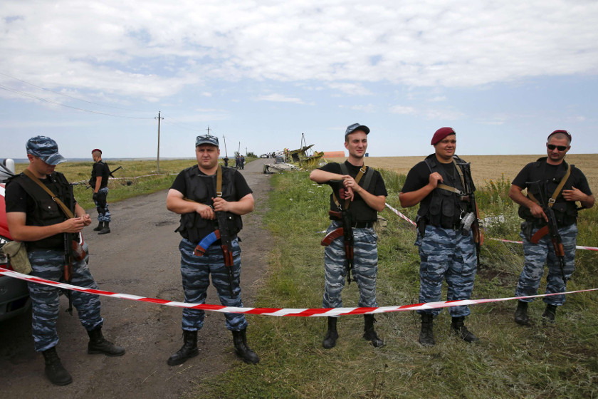 Armed pro-Russian separatists stand guard at a crash site of Malaysia Airlines Flight MH17, near the village of Hrabove, Donetsk region July 20, 2014. u00e2u20acu201d Reuters pic