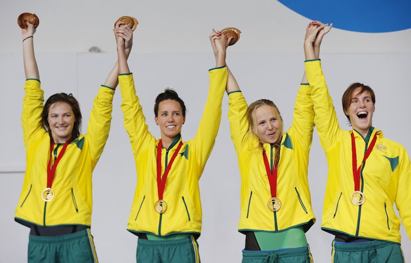 (From left) Australiau00e2u20acu2122s Cate Campbell, Emma McKeon, Melanie Schlanger and Bronte Campbell celebrate after receiving their gold medals for the Womenu00e2u20acu2122s 4x100m Freestyle at the 2014 Commonwealth Games in Glasgow July 24, 2014. u00e2u20acu201d Reuters pic