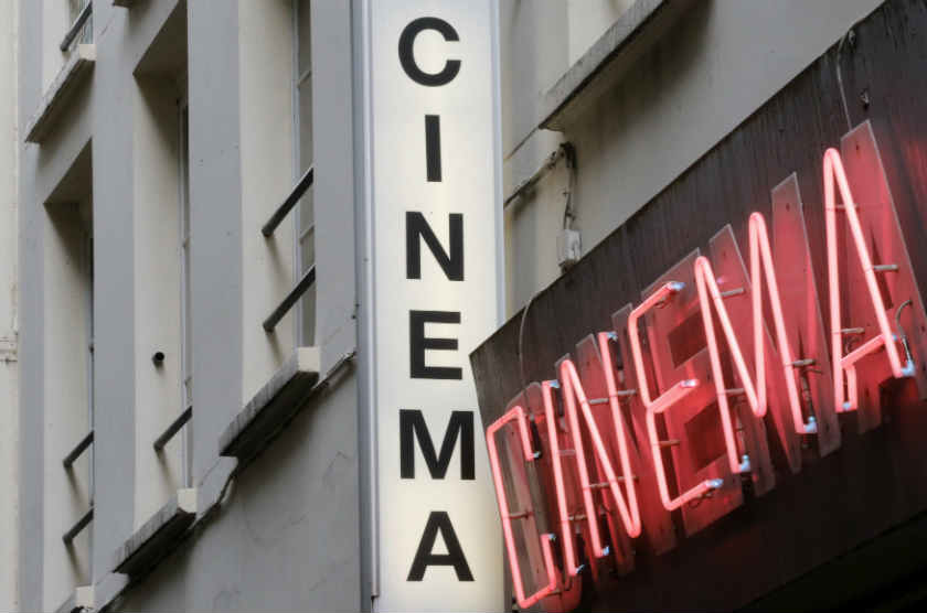 Cinema neon light signs are seen at the entrance of Le Beverley adult cinema in Paris July 30, 2014. u00e2u20acu201d Reuters pic