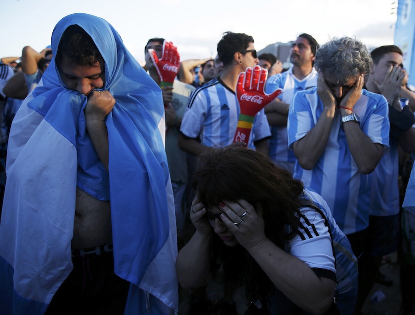 Argentine fans react as they watch a broadcast of the 2014 World Cup final match between Argentina and Germany at Copacabana beach in Rio de Janeiro July 14, 2014.u00c2u00a0u00e2u20acu201d Reuters pic