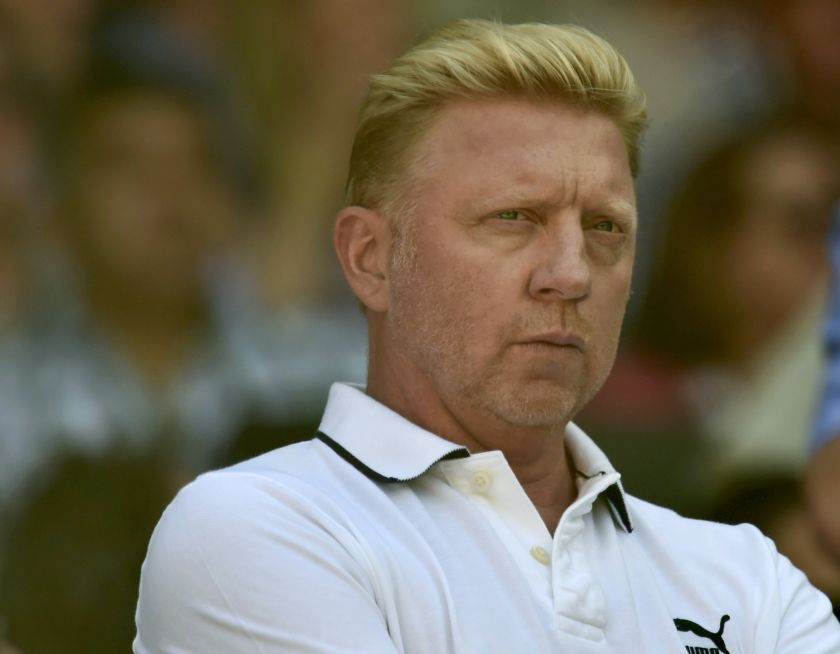 Boris Becker, the coach of Novak Djokovic of Serbia, sits on Centre Court for the men's singles semi-final tennis match between Djokovic and Grigor Dimitrov of Bulgaria at the Wimbledon Tennis Championships, in London. u00e2u20acu201d Reuters pic