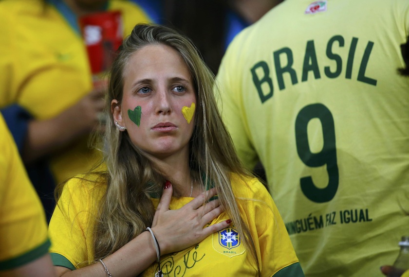 A Brazil fan reacts during the team's 2014 World Cup semi-finals against Germany at the Mineirao stadium in Belo Horizonte July 9, 2014.u00c2u00a0u00e2u20acu201d Reuters pic