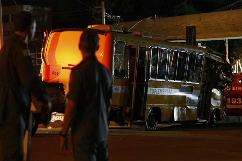 Police stand next to a bus trapped underneath a bridge that collapsed while under construction in Belo Horizonte July 3, 2014. u00e2u20acu201d Reuters pic