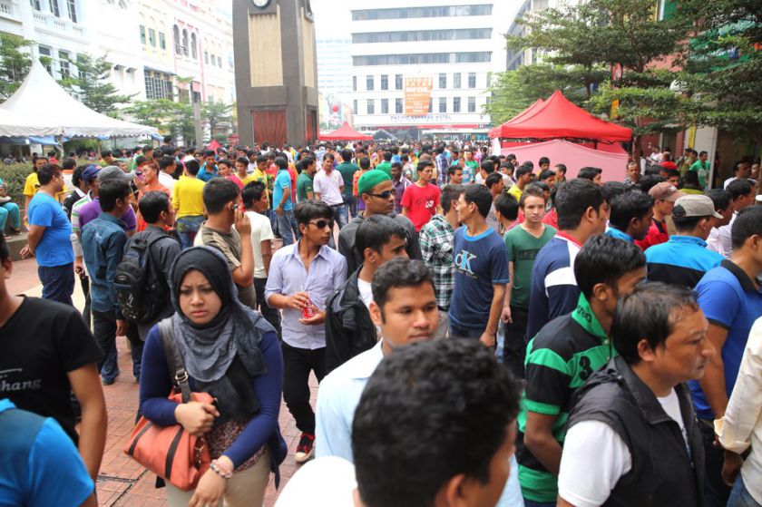 Foreign workers are seen at the Central Market Square in Kuala Lumpur on Hari Raya, 28, July, 2014. u00e2u20acu201d Picture by Choo Choy May
