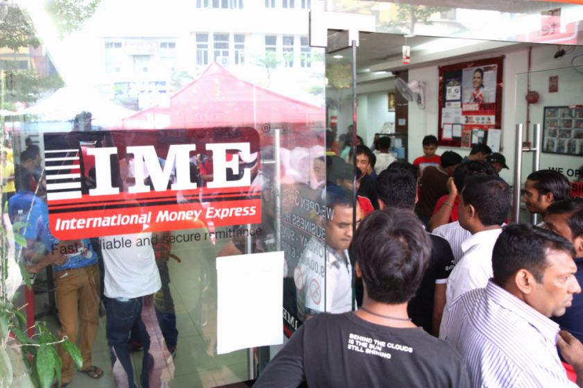 Foreign workers in Kuala Lumpur take advantage of the holiday on Hari Raya, to send money home, July 28, 2014. u00e2u20acu201d Picture by Choo Choy May