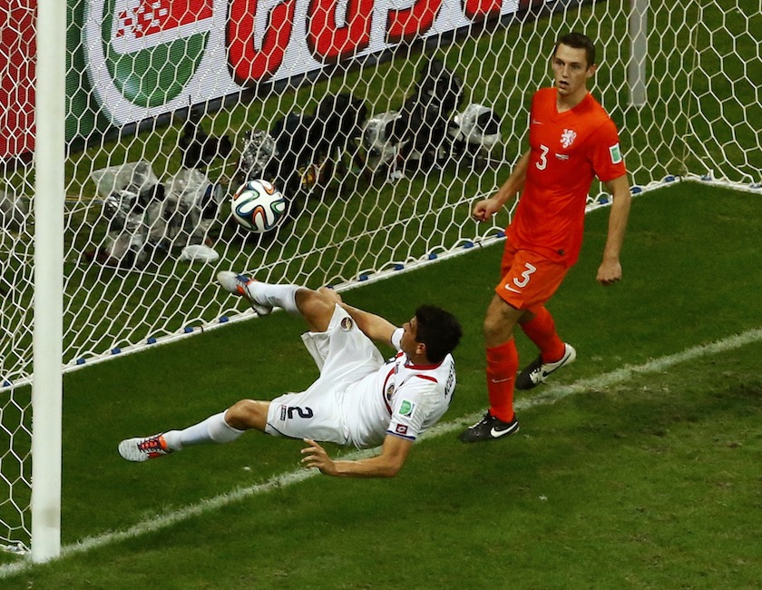 Costa Rica's Johnny Acosta clears the ball from the goalpost during extra time in their 2014 World Cup quarter-finals against Netherlands at the Fonte Nova arena in Salvador July 6, 2014. u00e2u20acu201du00c2u00a0Reuters pic