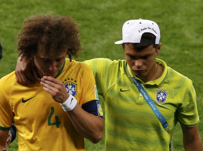 Brazil's David Luiz (left) and Thiago Silva react after they lost their during their 2014 World Cup semi-finals against Germany at the Mineirao stadium in Belo Horizonte July 9, 2014. u00e2u20acu201d Reuters pic