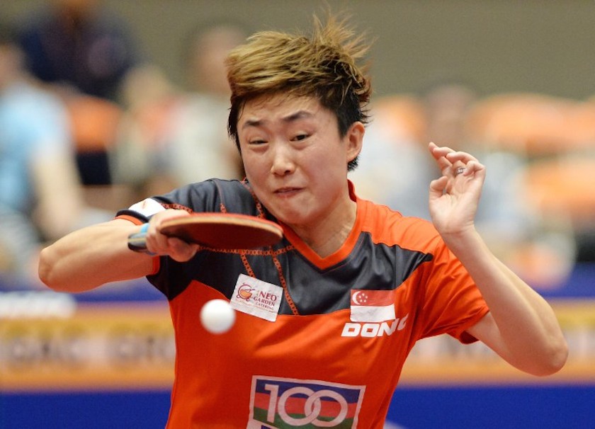 Singaporeu00e2u20acu2122s Feng Tianwei hits a return against Japanu00e2u20acu2122s Kasumi Ishikawa during their womenu00e2u20acu2122s singles final at the Japan Open table tennis tournament in Yokohama June 22, 2014. u00e2u20acu201d AFP pic