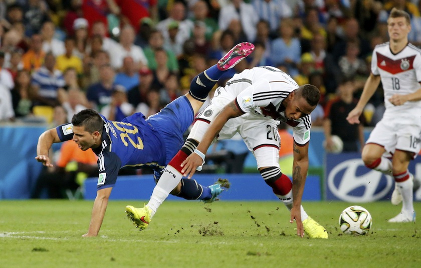 Argentina's Sergio Aguero falls as Germany's Jerome Boateng goes for the ball during their 2014 World Cup final at the Maracana stadium in Rio de Janeiro July 14, 2014.u00c2u00a0u00e2u20acu201d Reuters pic