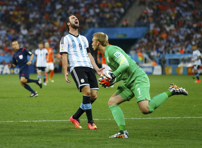 Argentina's Gonzalo Higuain reacts to goalkeeper Jasper Cillessen of the Netherlands saving his shot during their 2014 World Cup semi-finals at the Corinthians arena in Sao Paulo July 10, 2014. u00e2u20acu201d Reuters pic