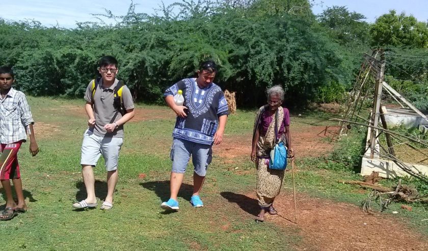 We take a stroll at the back of the Alangudi house with Ah Kit trying to sell my grandma an electronic cigarette I presume. — Picture by Praba Ganesan